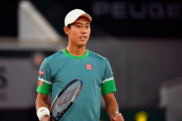 Kei Nishikori of Japan reacts during his Men's Singles fourth round match against Alexander Zverev of Germany on day eight of the 2021 French Open at...