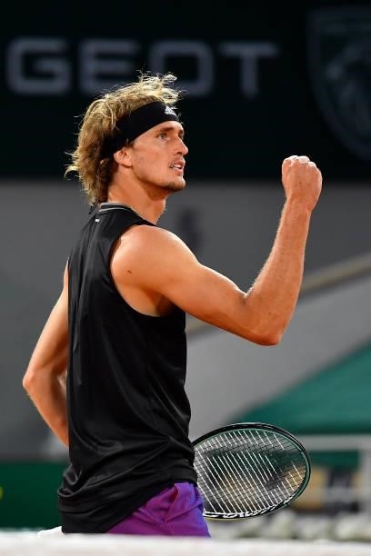Alexander Zverev of Germany reacts during his Men's Singles fourth round match against Kei Nishikori of Japan on day eight of the 2021 French Open at...