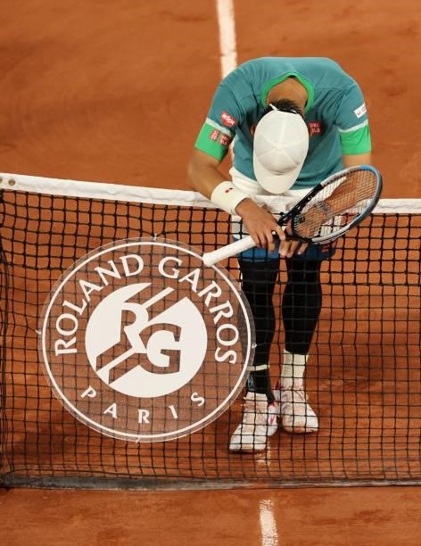 Kei Nishikori of Japan looks dejected after questioning a line call during his Men's Singles fourth round match against Alexander Zverev of Germany...