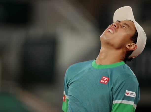 Kei Nishikori of Japan looks dejected during his Men's Singles fourth round match against Alexander Zverev of Germany on day eight of the 2021 French...