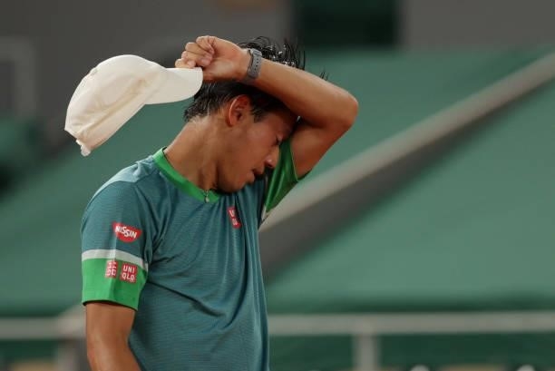 Kei Nishikori of Japan looks dejected during his Men's Singles fourth round match against Alexander Zverev of Germany on day eight of the 2021 French...