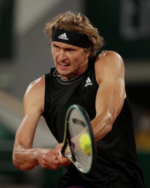 Alexander Zverev of Germany plays a backhand during his Men's Singles fourth round match against Kei Nishikori of Japan on day eight of the 2021...