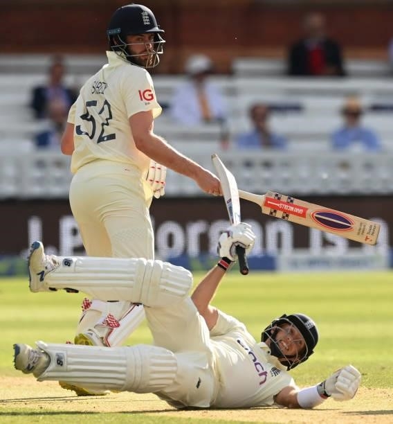 Joe Root finishes on the ground after colliding with Dom Sibley of England during Day 5 of the First LV= Insurance Test match between England and New...