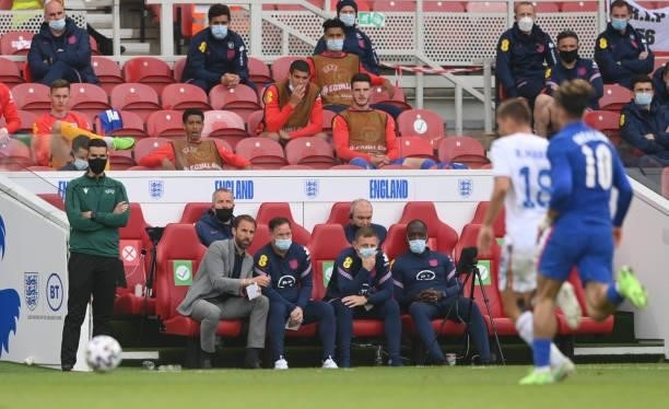 England coach Gareth Southgate and his coaching staff on the bench during the international friendly match between England and Romania at Riverside...