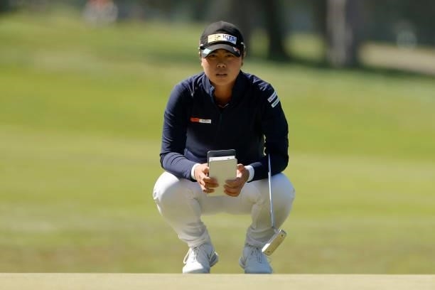 Yuka Saso of the Philippines lines up her putt on the ninth hole playoff against Nasa Hataoka of Japan during the final round of the 76th U.S....