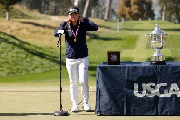 Yuka Saso of the Philippines celebrates with the Mickey Wright Medal after winning the 76th U.S. Women's Open Championship at The Olympic Club on...
