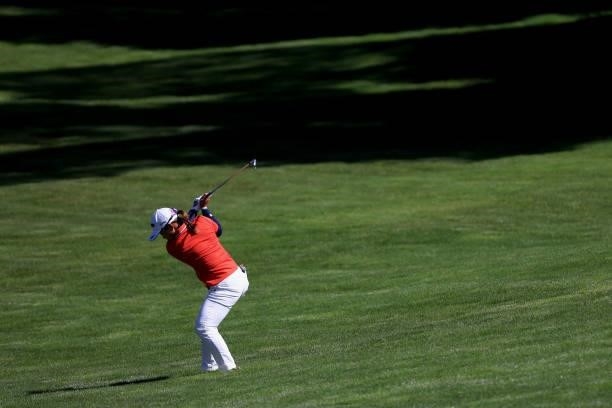 Nasa Hataoka of Japan hits an approach shot on the 18th hole playoff against Yuka Saso of the Philippines during the final round of the 76th U.S....