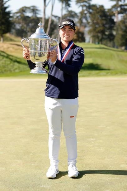 Yuka Saso of the Philippines celebrates with the Harton S. Semple Trophy after winning the 76th U.S. Women's Open Championship at The Olympic Club on...