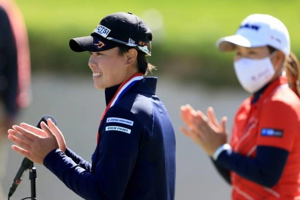 Yuka Saso of the Philippines celebrates after winning the 76th U.S. Women's Open Championship as Nasa Hataoka of Japan looks on at The Olympic Club...