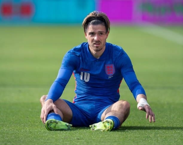 Jack Grealish of England sits on the floor after being fouled during the international friendly match between England and Romania at Riverside...