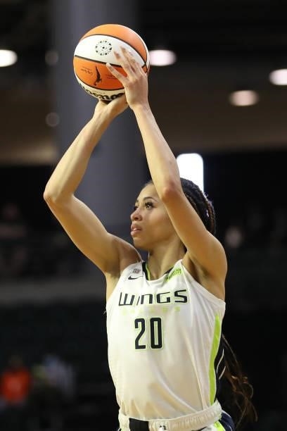 Isabelle Harrison of the Dallas Wings attempts a shot during the fourth quarter against the Seattle Storm at Angel of the Winds Arena on June 06,...
