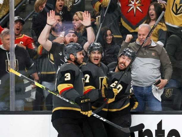 Brayden McNabb, Max Pacioretty and Chandler Stephenson of the Vegas Golden Knights celebrate Pacioretty's second-period goal against the Colorado...