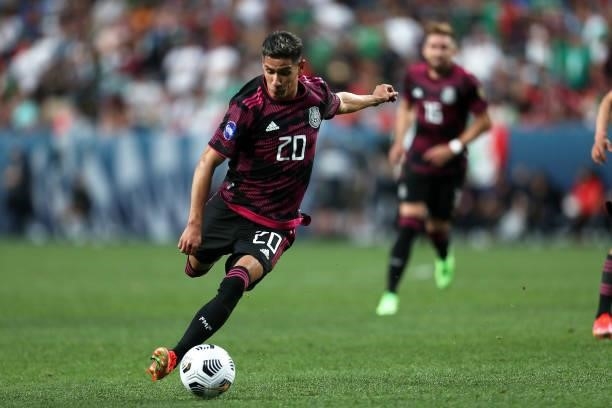 Uriel Antuna of Mexico kicks the ball during the CONCACAF Nations League Championship Final between United States and Mexico at Empower Field At Mile...