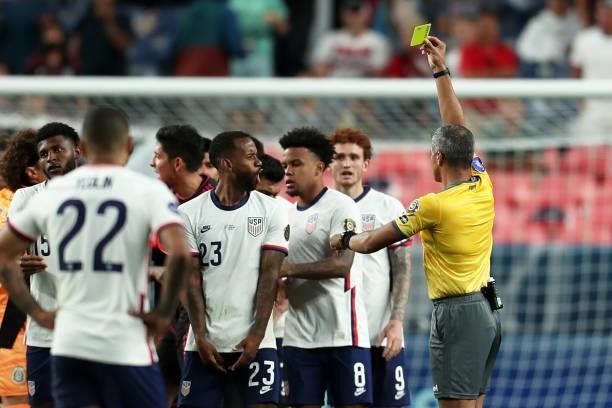 Kellyn Acosta of United States reacts after receiving a yellow card during the CONCACAF Nations League Championship Final between United States and...