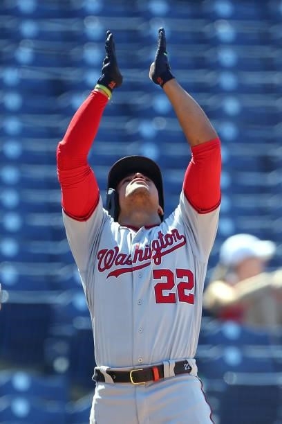 Juan Soto of the Washington Nationals gestures after he his a triple against the Philadelphia Phillies during a game at Citizens Bank Park on June 6,...