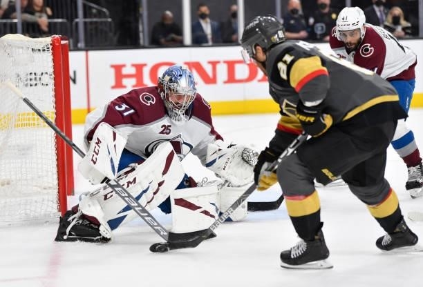 Philipp Grubauer of the Colorado Avalanche defends the net against Jonathan Marchessault of the Vegas Golden Knights during the third period in Game...