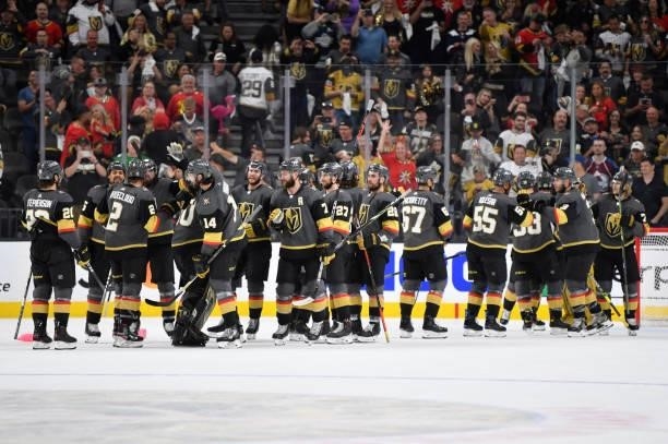 The Vegas Golden Knights celebrate after defeating the Colorado Avalanche in Game Four of the Second Round of the 2021 Stanley Cup Playoffs at...