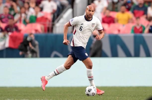 John Brooks of the United States dribbles with the ball during the CONCACAF Nations League Championship Final between the United States and Mexico at...