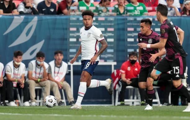 Weston McKennie of the United States dribbles with the ball during the CONCACAF Nations League Championship Final between the United States and...