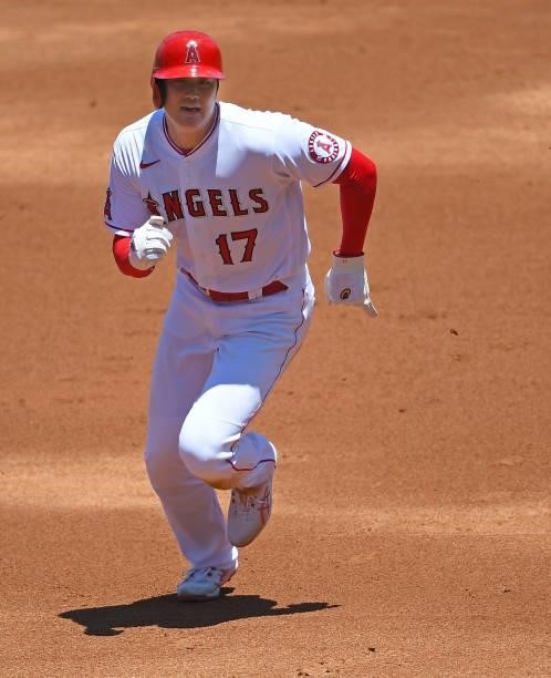 Shohei Ohtani of the Los Angeles Angels runs the bases in the game against the Seattle Mariners at Angel Stadium of Anaheim on June 6, 2021 in...