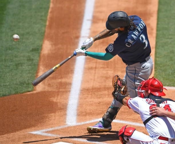 Crawford of the Seattle Mariners singles in the game against the Los Angeles Angels at Angel Stadium of Anaheim on June 6, 2021 in Anaheim,...