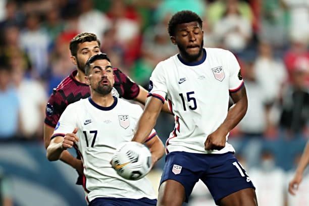 Mark McKenzie of United States use his hand to stop the ball during the CONCACAF Nations League Championship Final between United States and Mexico...