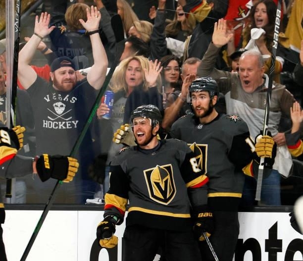 Jonathan Marchessault and Nicolas Roy of the Vegas Golden Knights celebrate Marchessault's second-period power-play goal against the Colorado...