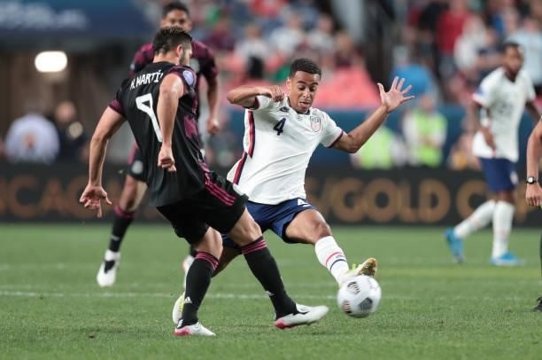 Tyler Adams of the United States defending during the CONCACAF Nations League Championship Final between United States and Mexico at Empower Field at...