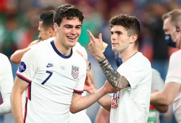 Christian Pulisic and Giovanni Reyna of the United States celebrate their win over Mexico in the Nations League Final during a game between Mexico...