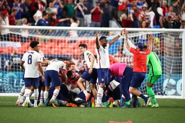 Christian Pulisic of the United States scores a penalty kick goal and celebrates during the CONCACAF Nations League Championship Final between United...