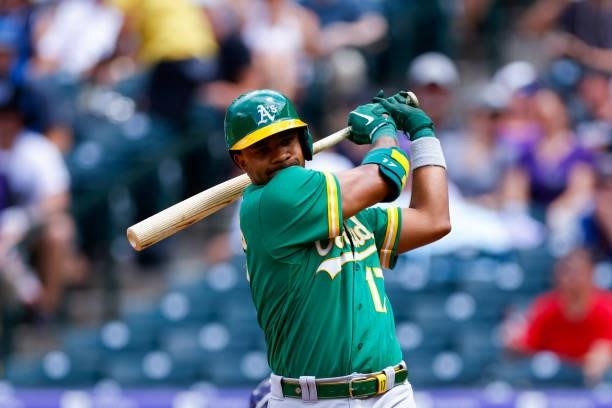 Elvis Andrus of the Oakland Athletics warms up before batting during the third inning against the Colorado Rockies at Coors Field on June 6, 2021 in...