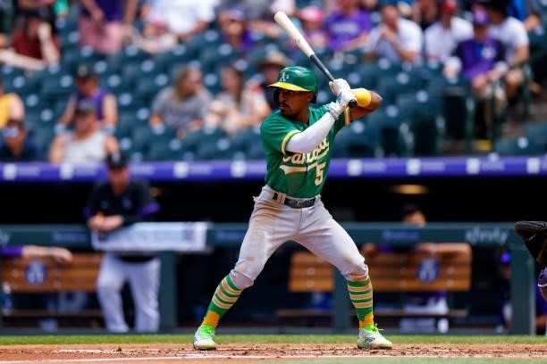 Tony Kemp of the Oakland Athletics bats during the third inning against the Colorado Rockies at Coors Field on June 6, 2021 in Denver, Colorado.