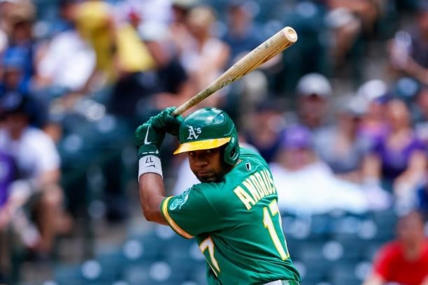 Elvis Andrus of the Oakland Athletics warms up before batting during the third inning against the Colorado Rockies at Coors Field on June 6, 2021 in...