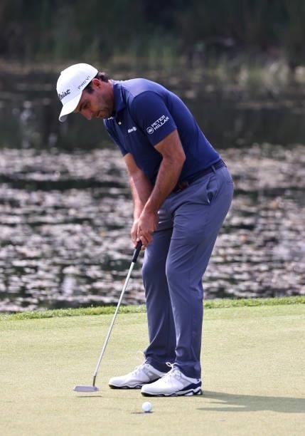 Edoardo Molinari of Italy putts on the 6th green during Day Three of The Porsche European Open at Green Eagle Golf Course on June 07, 2021 in...