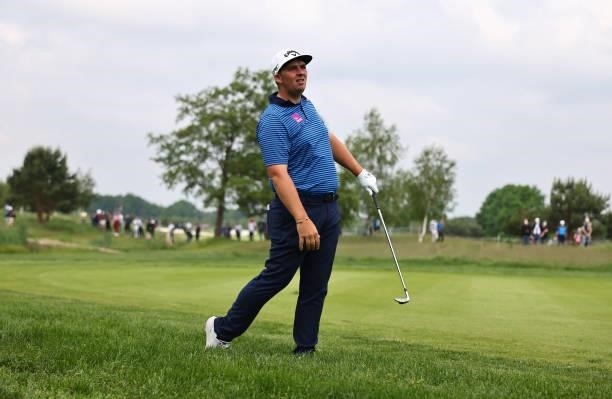 Marcus Armitage of England plays his third shot on the 16th hole during Day Three of The Porsche European Open at Green Eagle Golf Course on June 07,...