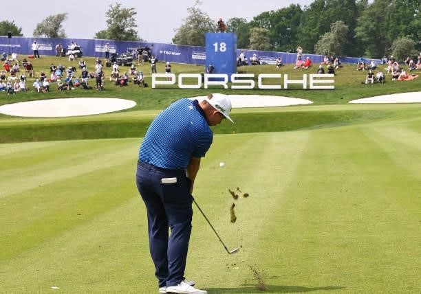 Marcus Armitage of England plays his third shot on the 18th hole during Day Three of The Porsche European Open at Green Eagle Golf Course on June 07,...