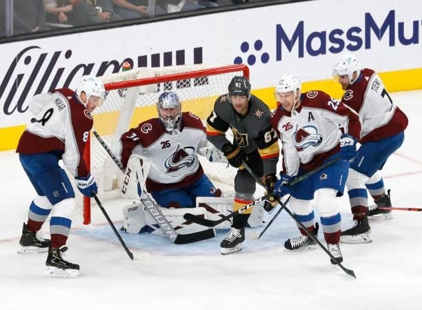 Max Pacioretty of the Vegas Golden Knights waits at the top of the crease defended by Cale Makar, Philipp Grubauer, Nathan MacKinnon, and Devon Toews...