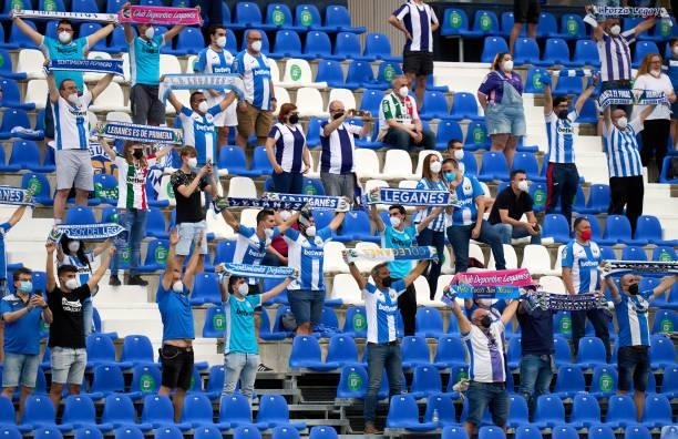 Fans of CD Leganes cheer from the stands during the Liga Smartbank Playoffs match between CD Leganes and Rayo Vallecano at Estadio Municipal de...