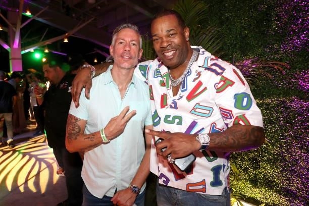 Barry Mullineaux and Busta Rhymes attend the exhibition boxing match between Floyd Mayweather and Logan Paul at Hard Rock Stadium on June 06, 2021 in...