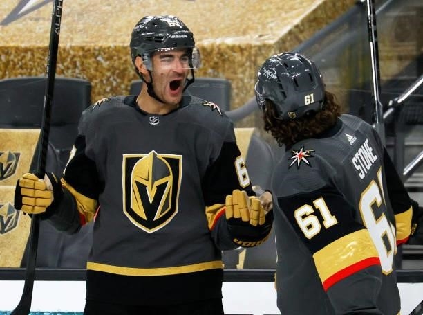 Max Pacioretty and Mark Stone of the Vegas Golden Knights celebrate after Stone assisted on Pacioretty's second-period goal against the Colorado...