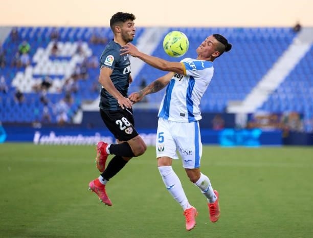 Jonathan Silva of CD Leganes competes for the ball with Mario Hernandez of Rayo Vallecano during the Liga Smartbank Playoffs match between CD Leganes...
