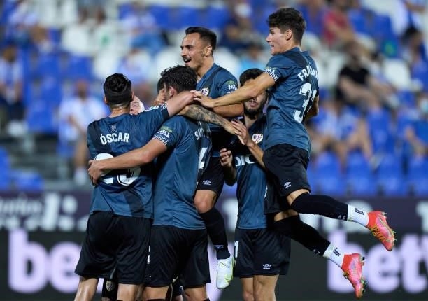 Emiliano Velazquez of Rayo Vallecano celebrates with team mates their side's first goal during the Liga Smartbank Playoffs match between CD Leganes...