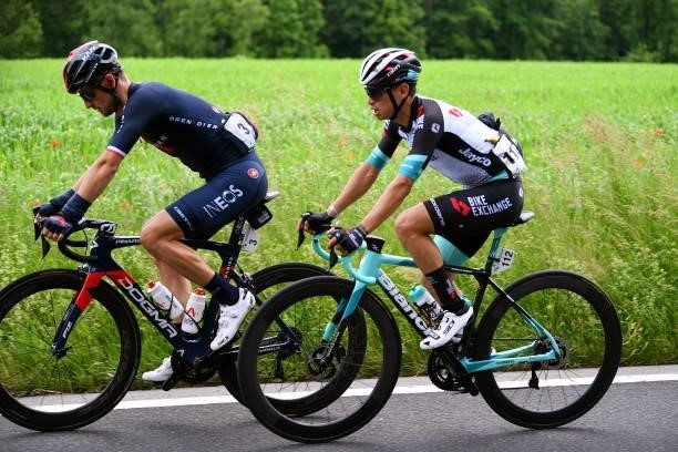Michal Golas of Poland and Team INEOS Grenadiers & Johan Esteban Chaves Rubio of Colombia and Team BikeExchange during the 84th Tour de Suisse 2021,...