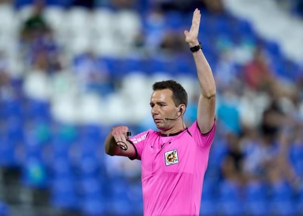 Referee Jose Antonio Lopez Toca gestures during the Liga Smartbank Playoffs match between CD Leganes and Rayo Vallecano at Estadio Municipal de...