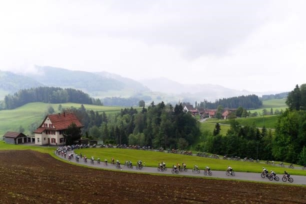 The peloton passing through Ghöch pass landscape during the 84th Tour de Suisse 2021, Stage 2 a 178km stage from Neuhausen am Rheinfall to Lachen /...
