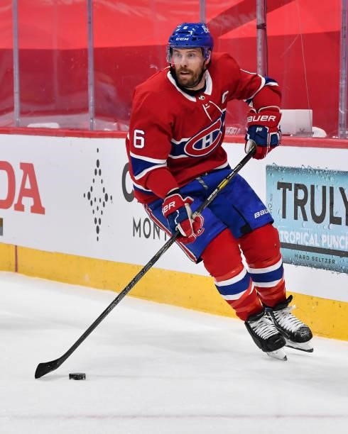 Shea Weber of the Montreal Canadiens skates the puck against the Winnipeg Jets during the first period in Game Three of the Second Round of the 2021...