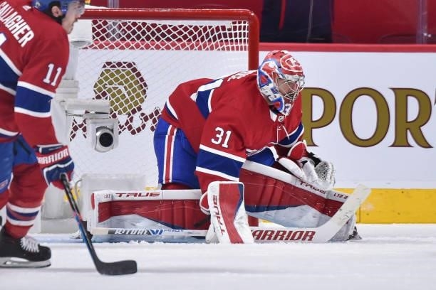 Carey Price of the Montreal Canadiens tends goal against the Winnipeg Jets during the second period in Game Three of the Second Round of the 2021...