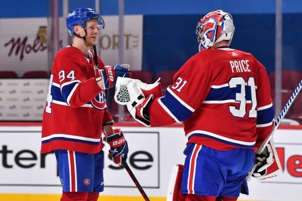 Corey Perry of the Montreal Canadiens congratulates goaltender Carey Price for their victory against the Winnipeg Jets in Game Three of the Second...