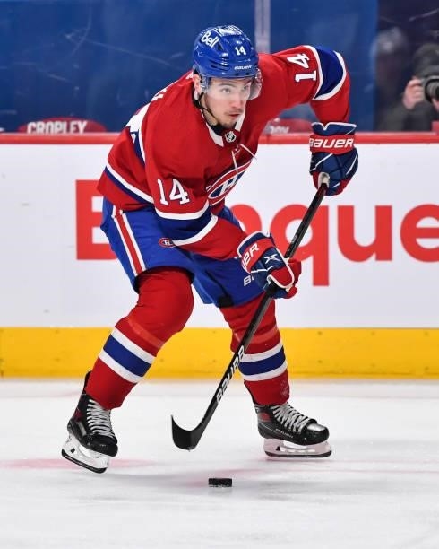 Nick Suzuki of the Montreal Canadiens skates the puck against the Winnipeg Jets during the second period in Game Three of the Second Round of the...