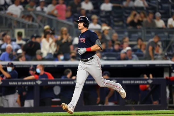 Bobby Dalbec of the Boston Red Sox runs the bases after he hit a two-run home run against the New York Yankees during the eighth inning of a game at...